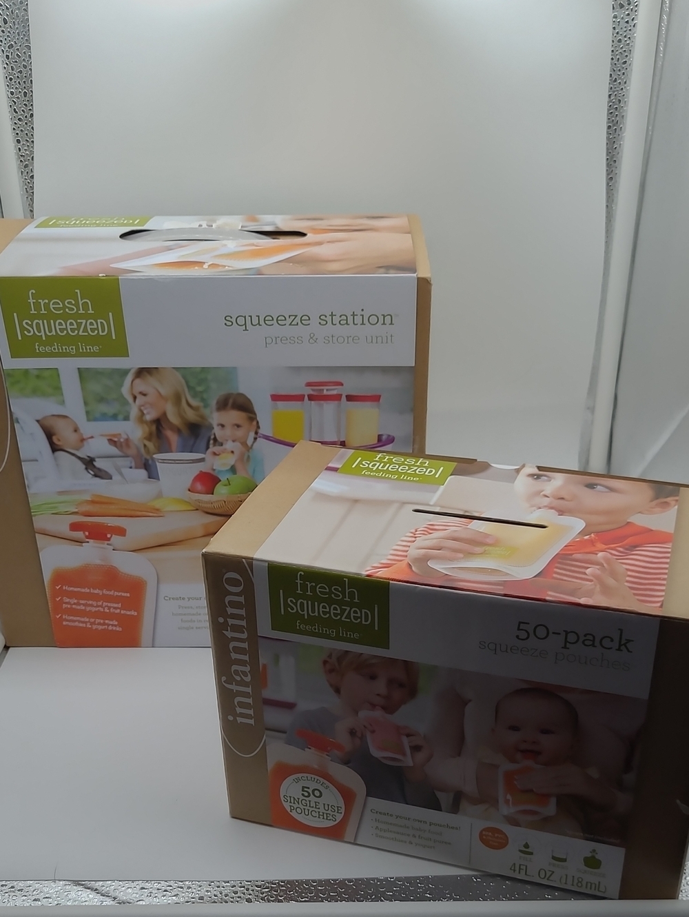 Infantino Fresh Squeezed Feeding Line Boxes in Green and Beige